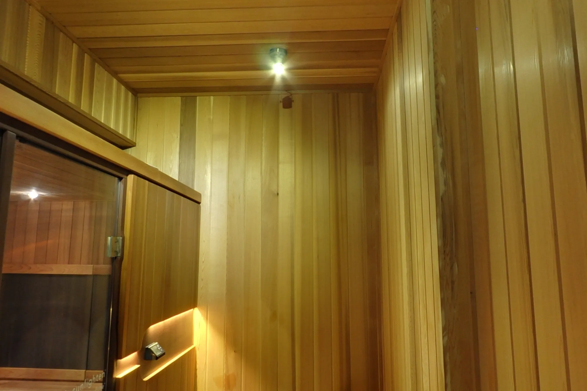 Cedar benches and walls of the infrared room.